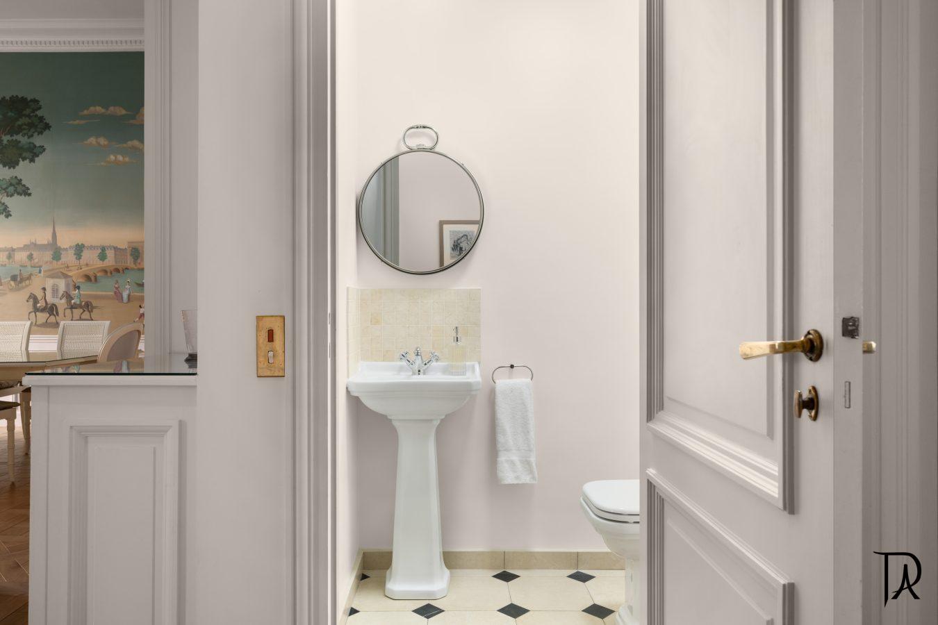 Toilet next to bathroom two Toilet next to bathroom two